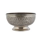 An openwork silver bowl, India, 20th century, on a slightly splayed foot, the body openwork with