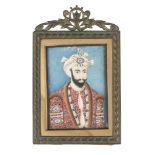 A framed miniature painting on ivory of a nobleman, India, 19th century, three-quarters portrait,