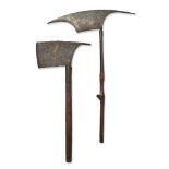Two Naga axes, North East India, 19th century, each with steel blade and wood handle, 55cm. and