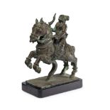 A bronze horse and rider, India, 19th century, mounted on plinth, 26cm. diam at basePlease refer