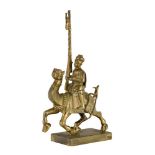 A brass Vizagapatam toy soldier, India, circa 1790, modelled riding a camel and carrying a