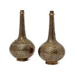 A pair of Koftgari rosewater sprinklers, India, circa 1870, of globular form, with slender neck