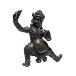A Tibetan gilt-bronze figure of Vajrapani, 19th century, standing in alidasana, his right hand