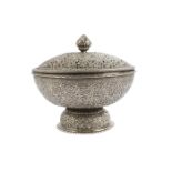 A silver lidded tazza, India, 19th-20th century, of typical form, on a raised foot with domed lid,