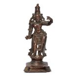 A bronze figure of Vishnu, India, 18th century, on a square, tiered base, rounded plinth, the figure