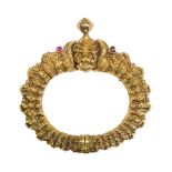 A ruby-set 'makara head' gold bracelet (Toda), South India, 19th Century, fabricated from gold sheet