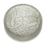 René Lalique (1860-1945), a small clear and frosted glass circular box and cover ‘Isabelle’, No. 64,