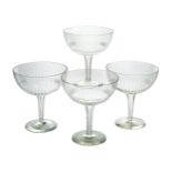 A set of four Magnum sized glass champagne coupes c.1960, possibly Czech Each large bowl cut with