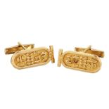 A pair of Egyptian inspired novelty cufflinks, each with hieroglyphs within royal cartouche, to