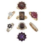 A group of 8 gem and synthetic rings, including: a 9ct gold ruby cluster ring; a 9ct gold garnet