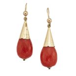 A pair of 19th century gold-mounted coral drop earrings, each with faceted pear-shaped coral