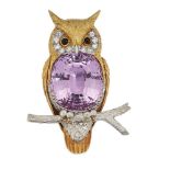 A kunzite and diamond owl brooch, modelled as a two-colour owl perched on a tree branch, the body