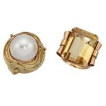 A citrine ring and a cultured pearl ring, the first with claw-set rectangular citrine with