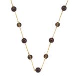 A garnet and quartz necklace, the fine chain-link necklace with spherical garnet and transparent