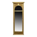 A North German Neoclassical carved giltwood and silvered mirror, early 19th century, with a plain