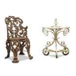 A late Victorian cast-iron chair, late 19th/early 20th century, with acanthus scrolling back and