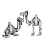 Frank Meisler, Israeli 1950-2010, two silvered metal models of sectional camels, signed to the