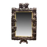 A large Baroque Continental carved rectangular frame, first half 18th century, mounted as a