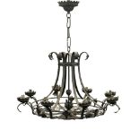 Three wrought-iron eight light Gothic taste open work chandeliers, 20th century, the frame work with