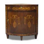 A Dutch floral marquetry corner cabinet, 19th Century, of bow front form, with three frieze drawers,