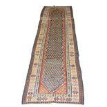 A North West Persian Soumak runner, mid to late 20th century, the deep blue field with zig zag edge,