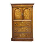 An Edwardian rosewood and marquetry inlaid cupboard, the dentil moulded cornice above two arch