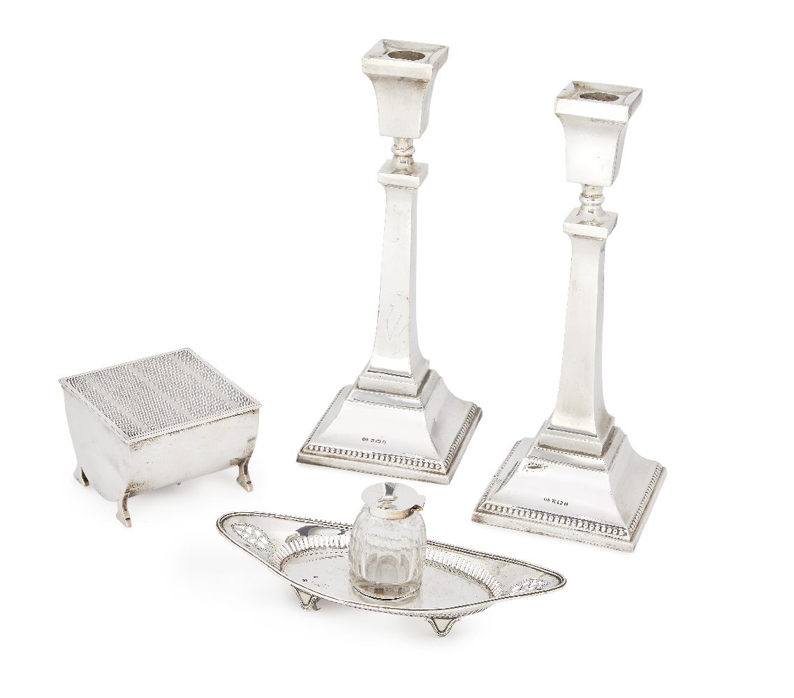 A pair of silver candlesticks, Birmingham c.1976, Alexander Smith, with square tapering column