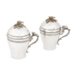 A pair of Turkish Ottoman Empire silver cups and covers, the domed cover with bird nesting on