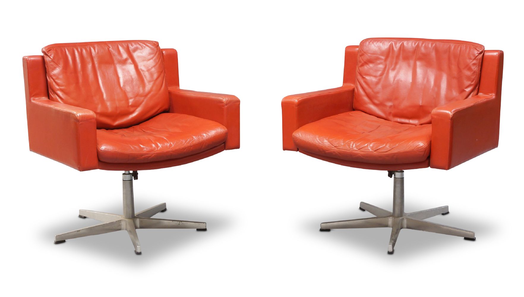 Robert Haussmann, a pair of model 'RH201' swivel armchairs for De Sede, c.1960, upholstered in red