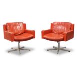 Robert Haussmann, a pair of model 'RH201' swivel armchairs for De Sede, c.1960, upholstered in red