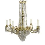 A similar pair of eight light gilt metal and lustre hung chandeliers, 20th century, with central