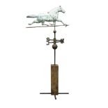 A copper and sheet metal weathervane on stand, possibly American, late 19th/early 20th century,
