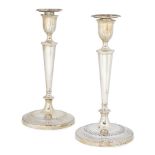 A pair of George III silver candlesticks, Sheffield c.1789, John Parsons & Co., of tapering form,
