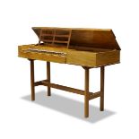 A walnut 5 octave clavichord on stand by John Morley, London, of rectangular form with lifting