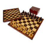A Staunton pattern club size boxwood and ebony weighted chess set, 20th century, the kings 12cm