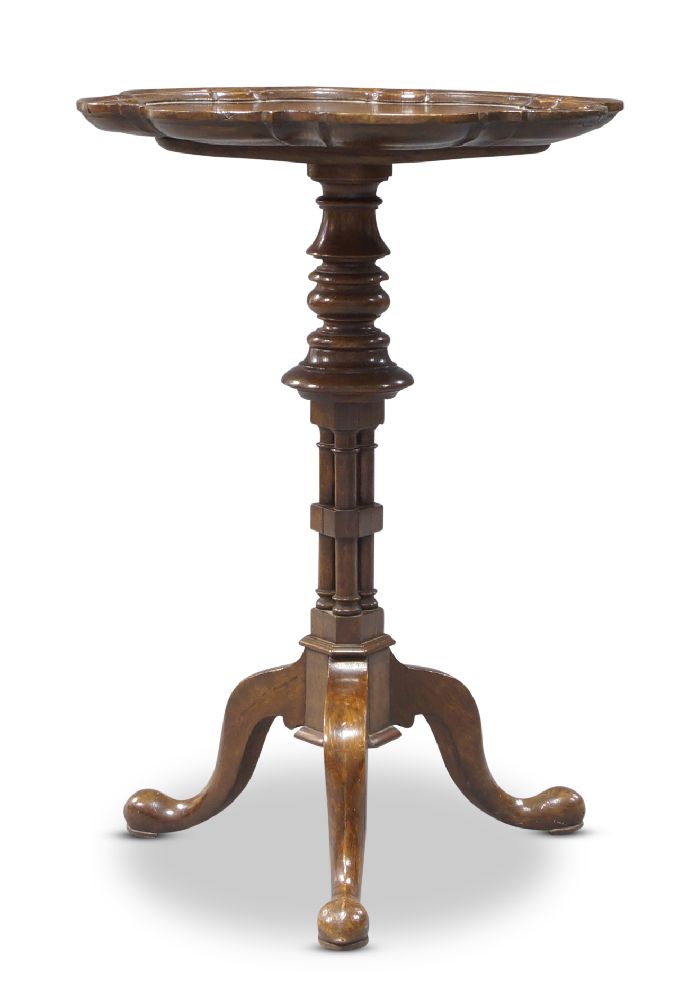 A George IV oak occasional table, attributed to Gillows, the circular lobed top on cluster column