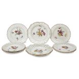 A set of six Meissen plates, late 19th century, with reticulated basket weave rims and moulded