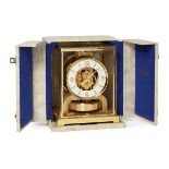 A Jaeger Le Coultre Atmos Clock, 20th century, the white ring form dial with Arabic numeral