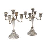 A pair of Greek 900 fineness silver candelabra, with four scrolling branches above tapering