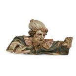 A Continental carved and painted wood fragmentary figure of a man, 17th/18th century, modelled in