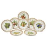 A set of eight Royal Copenhagen Flora Danica Fruit plates, 20th century, with pierced and gilt rims,