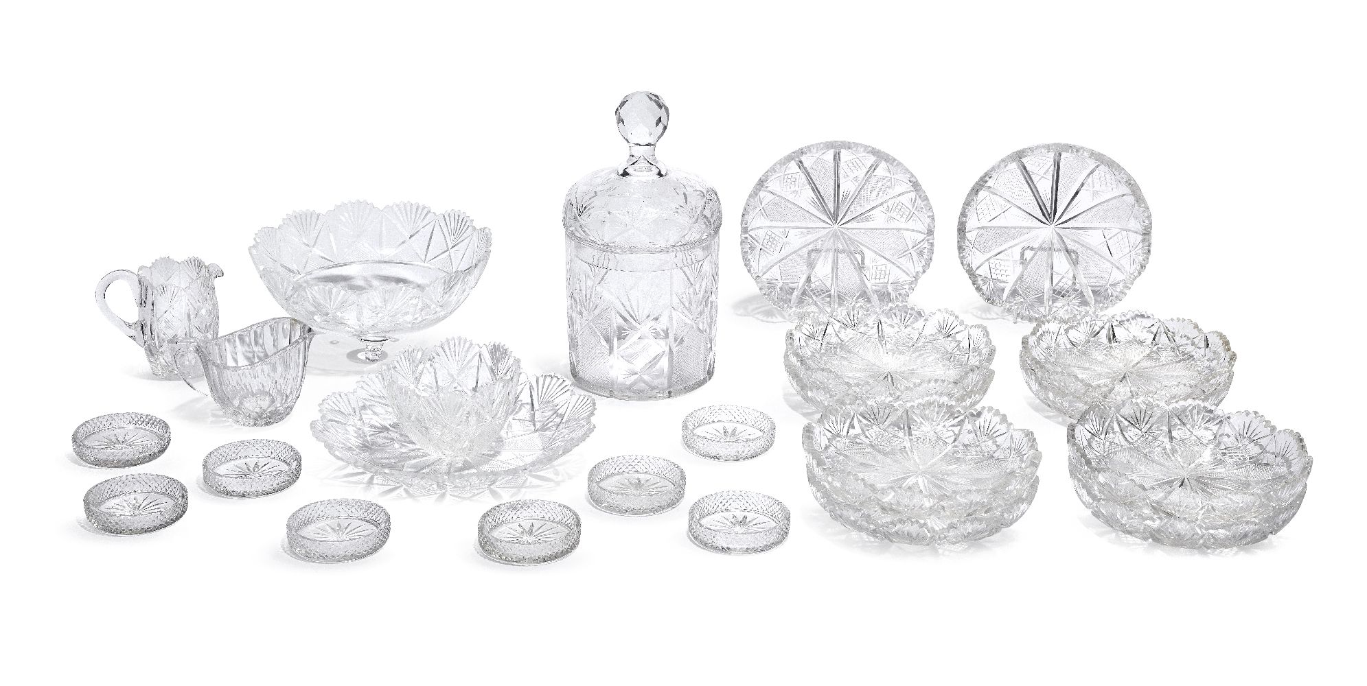 A set of ten circular cut glass dishes, late 19th century, with cut petal form rims, the bodies with