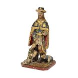 A Continental polychrome carved wood model of Saint Roch, 18th century, wearing a pilgrims hat and