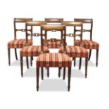 A set of six Regency mahogany bar back dining chairs, the curved backrests, with carved and