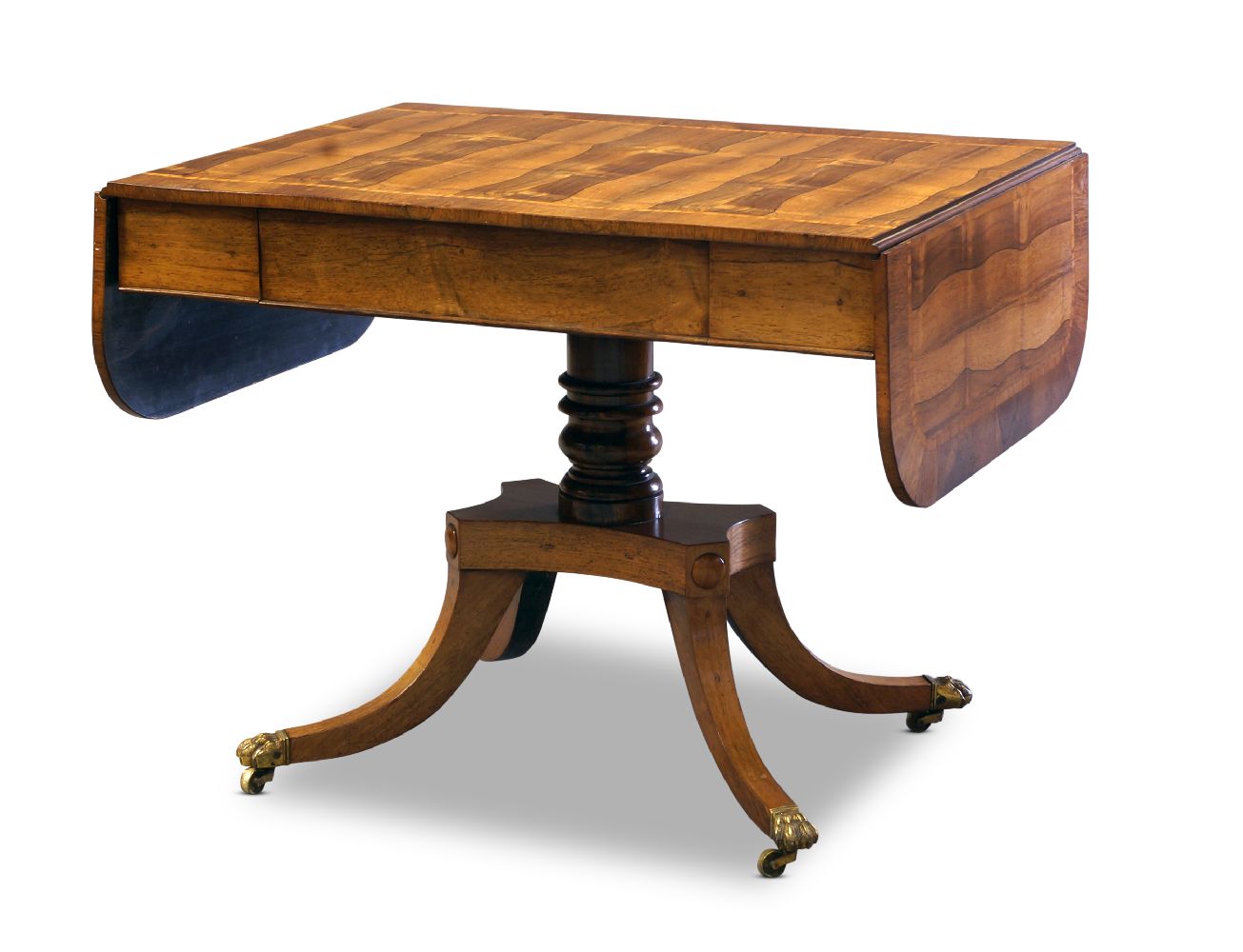 A Regency rosewood and satinwood crossbanded sofa table, the rectangular top with two drop leaves,