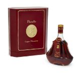 A bottle of Paradis Henessy Cognac, in a presentation caseminor wear to case at high pointsminor