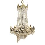 An eleven light gilt metal and lustre hung chandelier, 20th century, with beaded and reeded