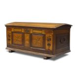 A Dutch oak and marquetry inlaid trunk, 19th Century, the domed lid, enclosing candle box and