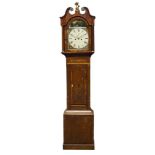 A mahogany and oak longcase clock, 19th century, the hood with swan neck pediment centred by a