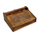 An olivewood souvenir writing slope, late 19th/early 20th century, with a tambour section opening to